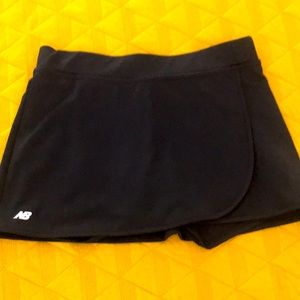 Women’s New Balance black athletic skirt